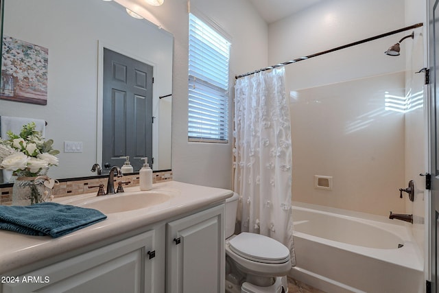 full bathroom with vanity, toilet, and shower / bathtub combination with curtain