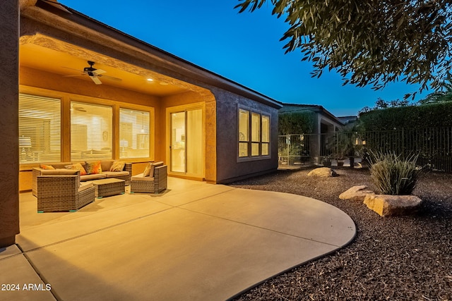 view of patio with outdoor lounge area and ceiling fan