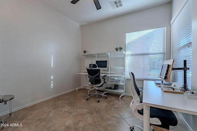 office area featuring light tile patterned flooring