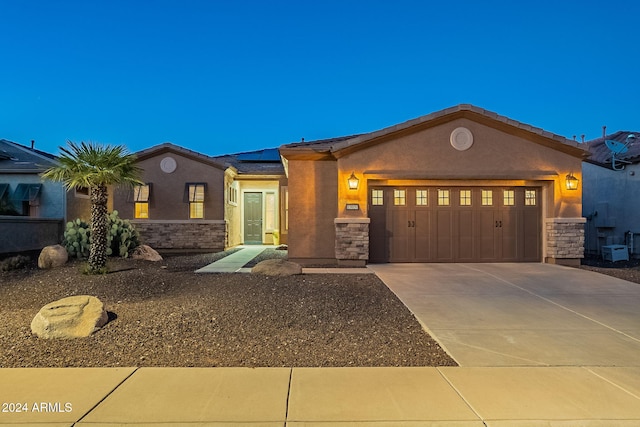 view of front of house with a garage