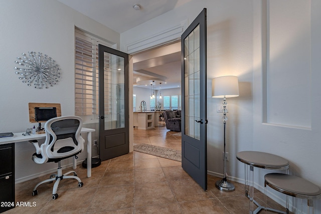 office featuring light tile patterned floors and french doors