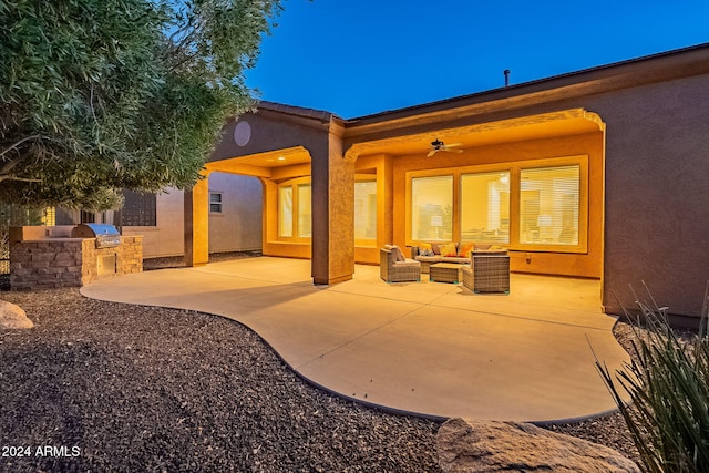 rear view of house with a patio, outdoor lounge area, an outdoor kitchen, and ceiling fan