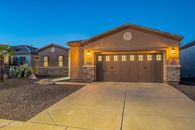 view of front of house with a garage