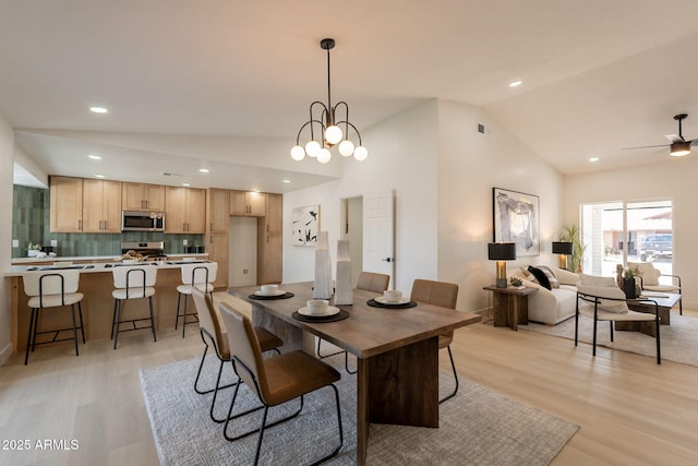 1609 W Yukon Dr, Phoenix, AZ 85027 - dining room with vaulted ceiling, light wood-type flooring, a ceiling fan, and recessed lighting