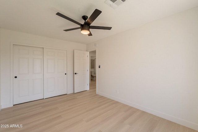 1609 W Yukon Dr, Phoenix, AZ 85027 - unfurnished bedroom with light wood finished floors, a closet, and ceiling fan
