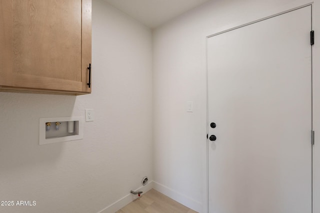 1609 W Yukon Dr, Phoenix, AZ 85027 - laundry area with cabinet space, hookup for a washing machine, and light wood-style floors