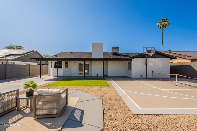 1609 W Yukon Dr, Phoenix, AZ 85027 - back of house with a chimney and a tennis court