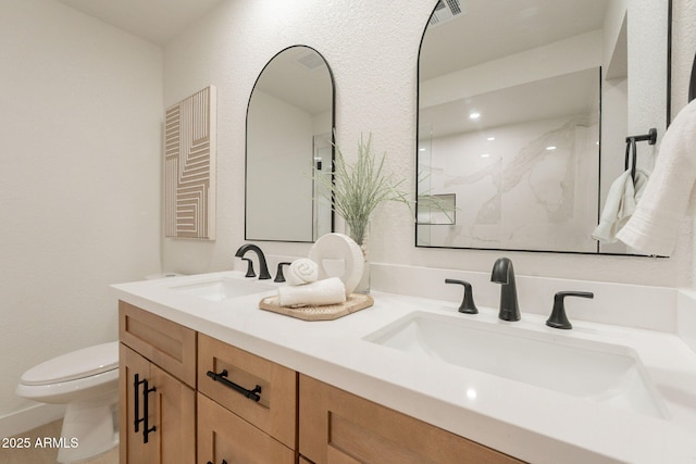 1609 W Yukon Dr, Phoenix, AZ 85027 - bathroom featuring double vanity and toilet