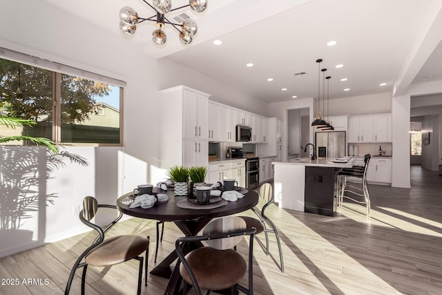 dining space featuring sink