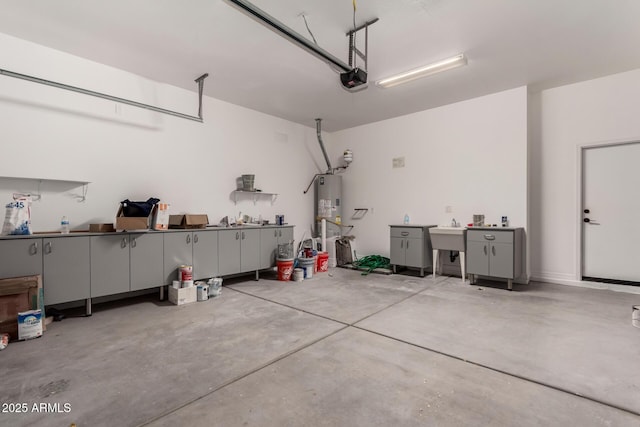 garage featuring a garage door opener and gas water heater