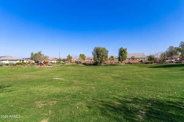 view of community featuring a lawn