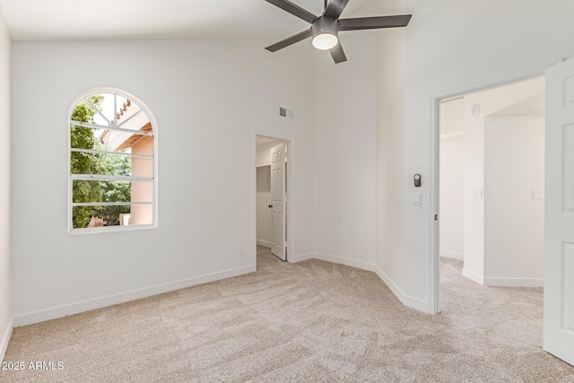 6439 E Redmont Dr, Mesa, AZ 85215 - unfurnished room with carpet floors, ceiling fan, and high vaulted ceiling