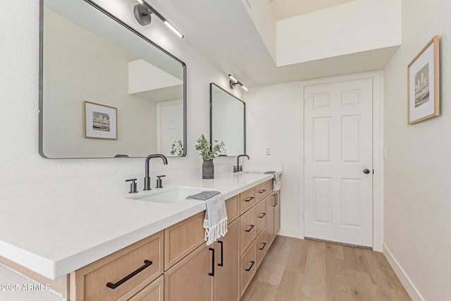 6439 E Redmont Dr, Mesa, AZ 85215 - full bathroom with double vanity and wood finished floors