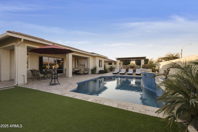 view of pool featuring a yard, a patio area, and a pergola