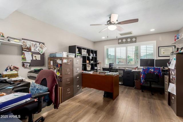 office space with hardwood / wood-style flooring and ceiling fan