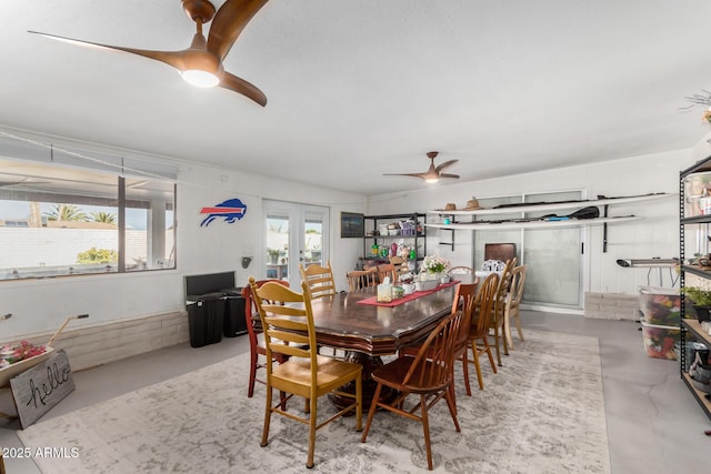 dining room featuring french doors and ceiling fan