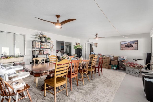 dining room featuring ceiling fan