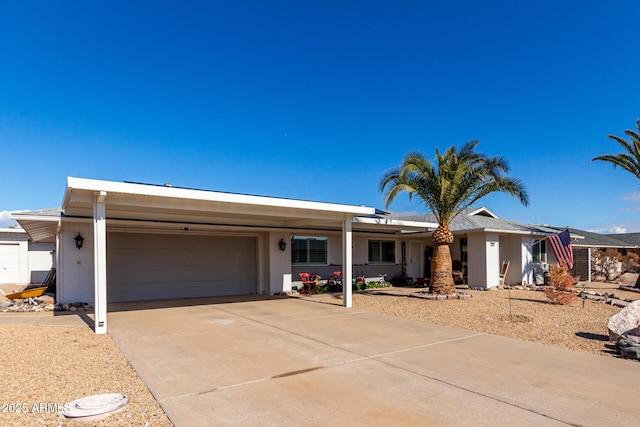 ranch-style house featuring a garage