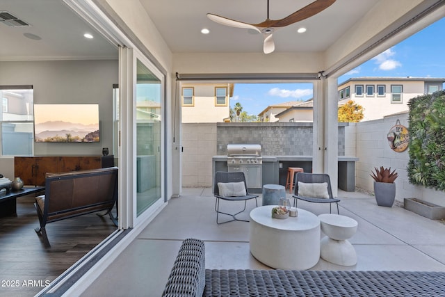 1555 E Ocotillo Rd Unit 16, Phoenix, AZ 85014 - fenced backyard with ceiling fan, a patio area, and area for grilling