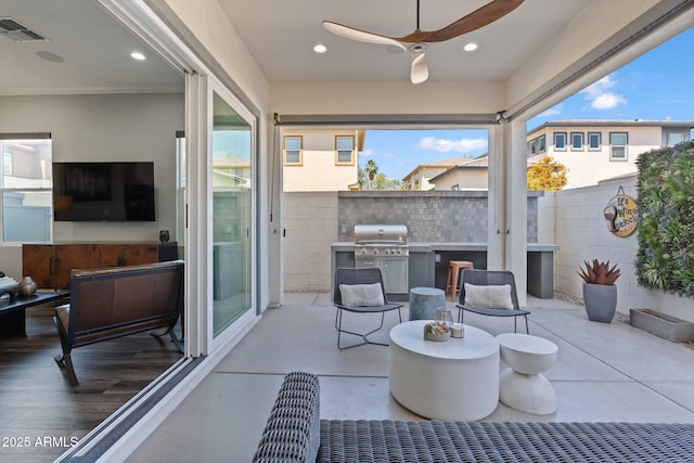1555 E Ocotillo Rd Unit 16, Phoenix, AZ 85014 - view of patio / terrace with a ceiling fan and a grill