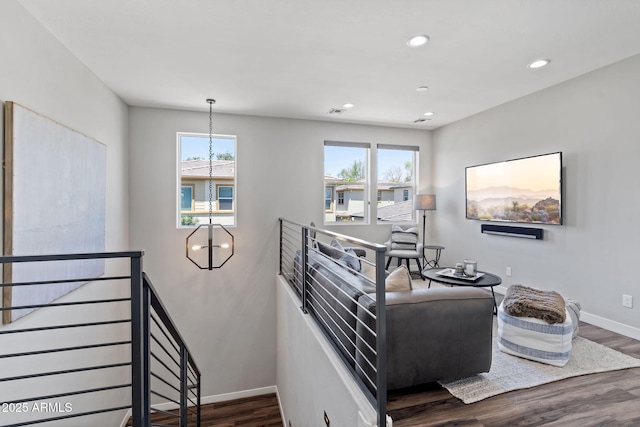 1555 E Ocotillo Rd Unit 16, Phoenix, AZ 85014 - stairs with a chandelier, wood finished floors, healthy amount of natural light, baseboards, and recessed lighting
