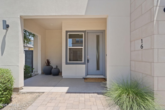 1555 E Ocotillo Rd Unit 16, Phoenix, AZ 85014 - view of exterior entry featuring stucco siding