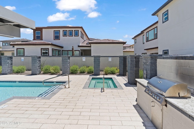 1555 E Ocotillo Rd Unit 16, Phoenix, AZ 85014 - community pool featuring a hot tub and a patio area