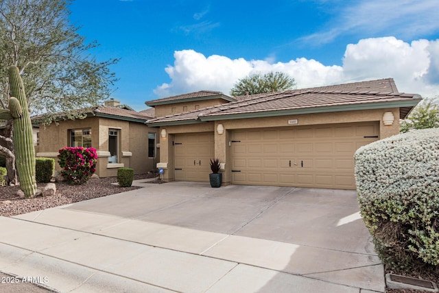 prairie-style house featuring a garage