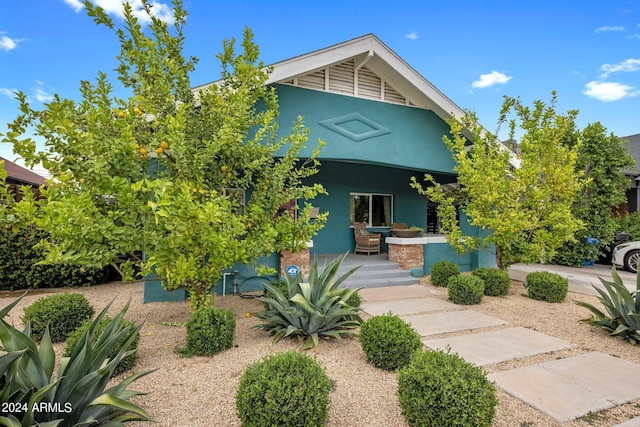 view of front of property featuring covered porch