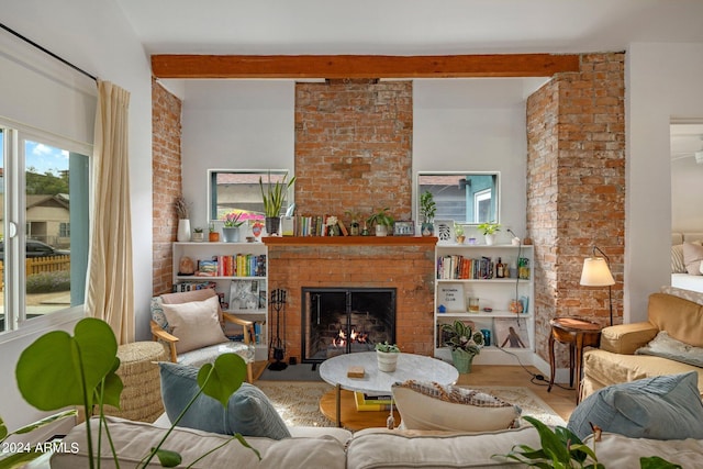 interior space with a fireplace and beam ceiling