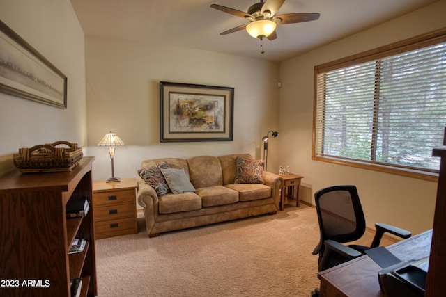 home office with carpet and ceiling fan