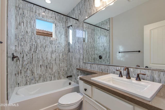 3285 Maverick Dr, Wickenburg, AZ 85390 - full bath featuring vanity, bathtub / shower combination, toilet, tile walls, and decorative backsplash