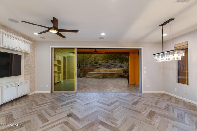 3285 Maverick Dr, Wickenburg, AZ 85390 - unfurnished living room with baseboards, a ceiling fan, and recessed lighting