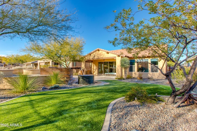 3285 Maverick Dr, Wickenburg, AZ 85390 - rear view of property with stucco siding, a tiled roof, and central AC