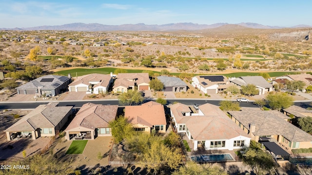3285 Maverick Dr, Wickenburg, AZ 85390 - aerial perspective of suburban area with a mountain backdrop
