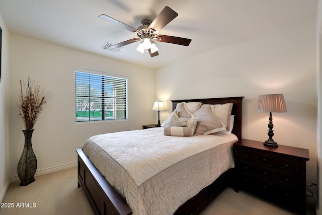 bedroom with a ceiling fan, light carpet, visible vents, and baseboards