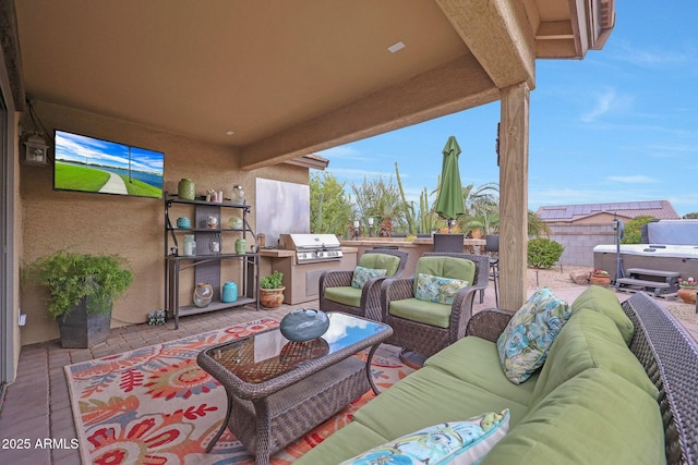 view of patio / terrace featuring area for grilling, an outdoor kitchen, and outdoor lounge area