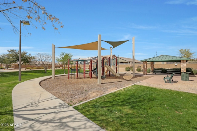 community jungle gym with a yard