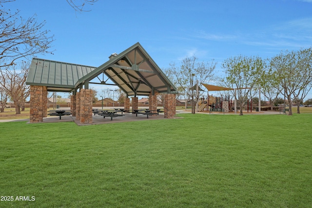 view of property's community with a gazebo, a yard, and a playground