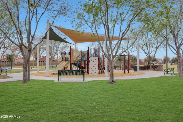 community playground featuring a yard