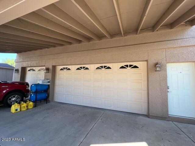 garage with driveway