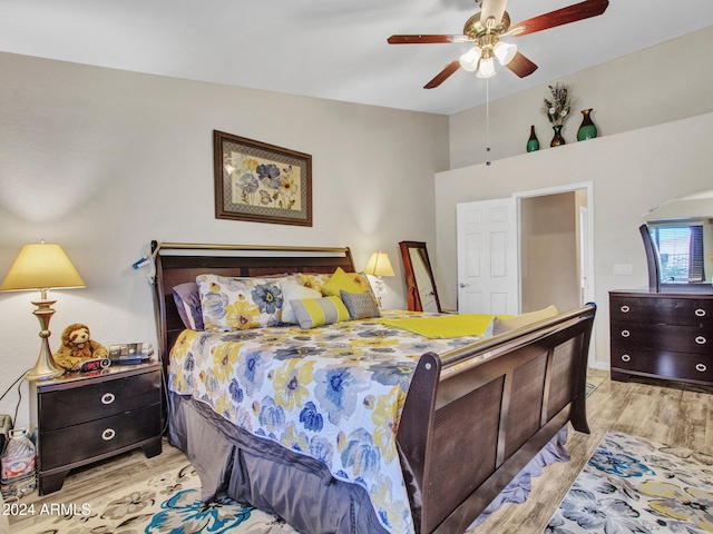 bedroom featuring ceiling fan and light hardwood / wood-style floors