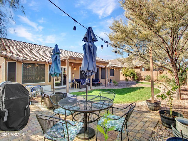 view of patio / terrace featuring a grill and outdoor lounge area