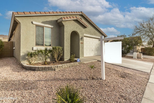 view of front of home featuring a garage