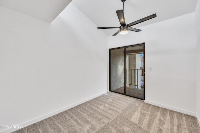 empty room featuring ceiling fan, carpet floors, and baseboards