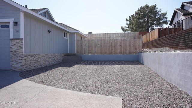 view of yard with a garage