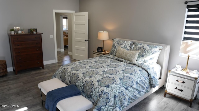 bedroom with dark wood-type flooring