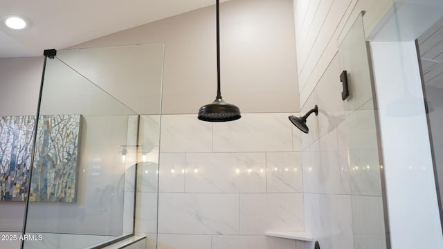 interior details with a tile shower