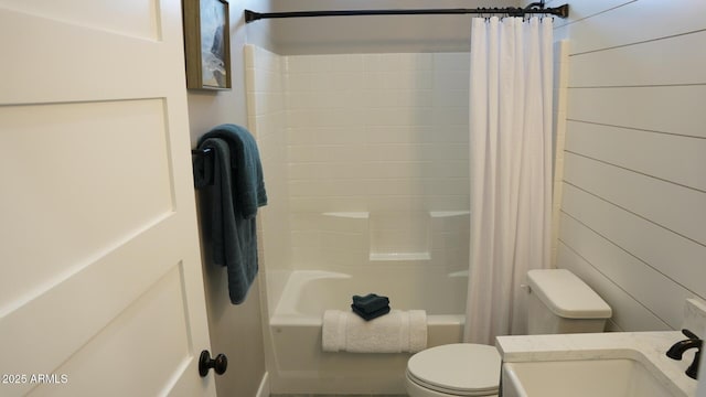 full bathroom featuring shower / tub combo, vanity, and toilet