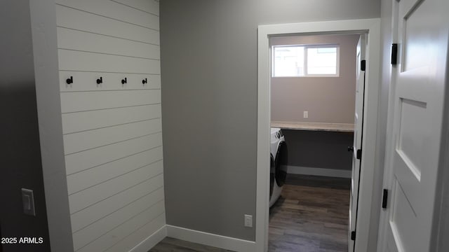 clothes washing area with hardwood / wood-style floors